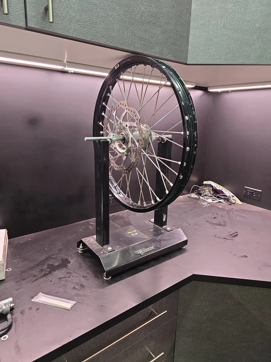 Wheel mounted on a truing stand in the Berryland shop