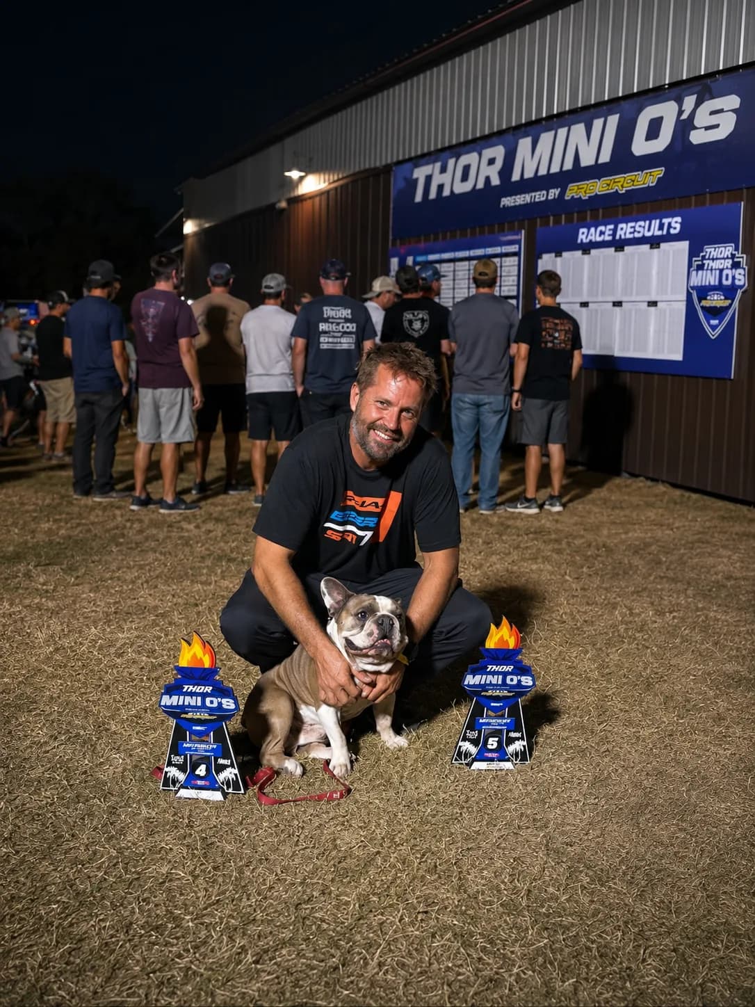 Mike Stevenson with Berry beside Mini O's trophies