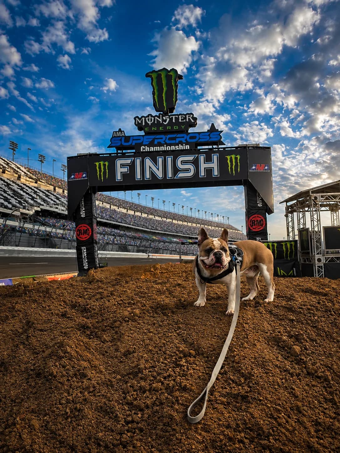 Berry standing in front of the Monster Energy Supercross finish line
