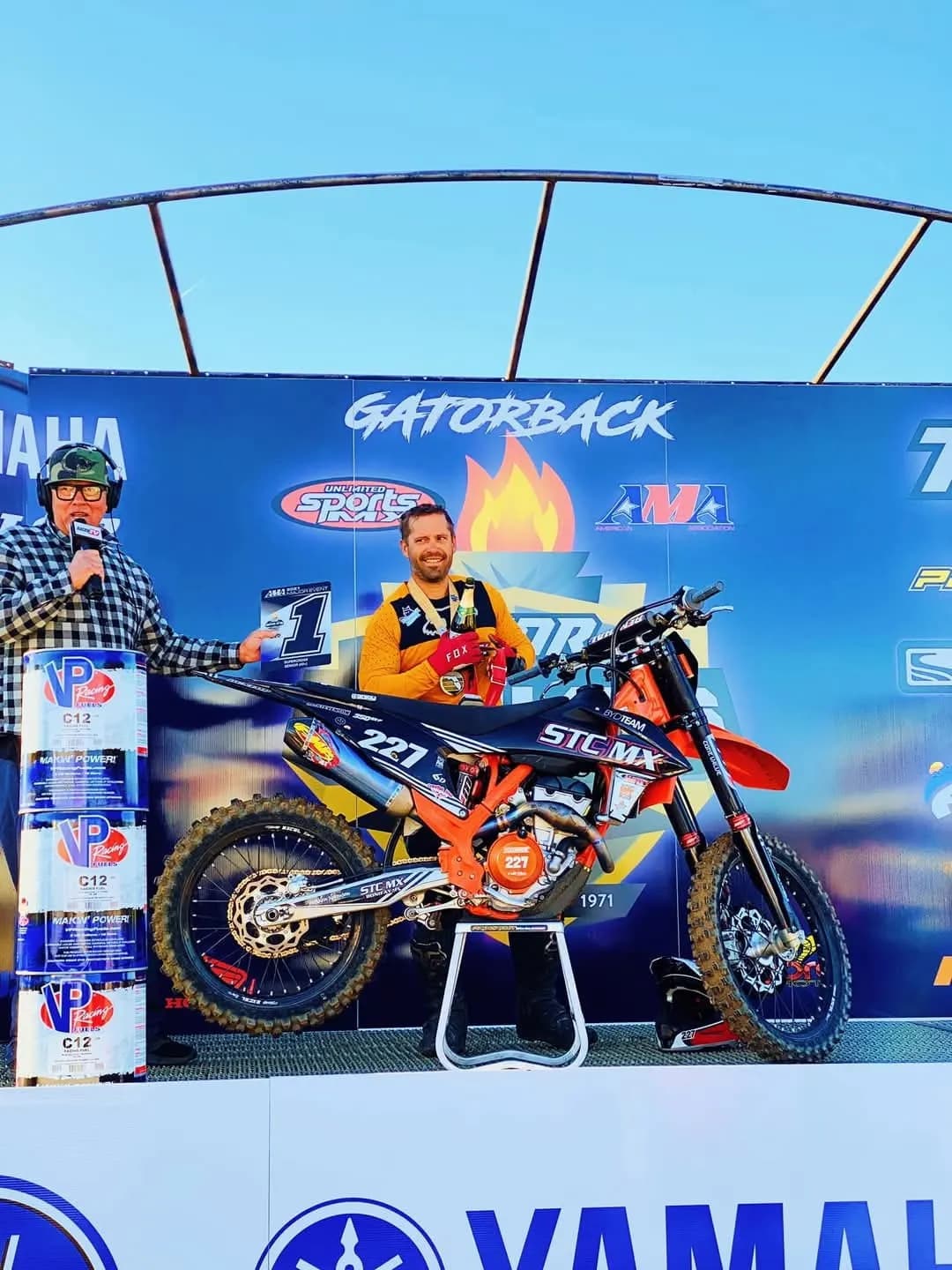 Mike Stevenson on the podium at Gatorback with his number 227 race bike