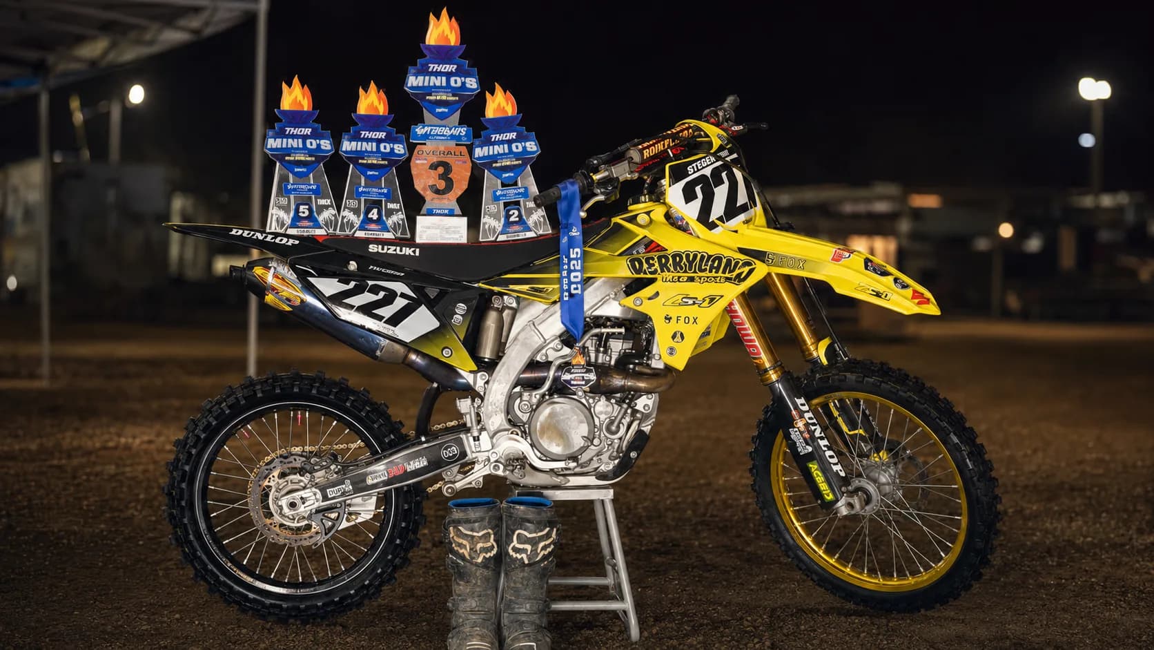 Mike Stevenson's number 227 race bike displayed with his Mini O's championship plates